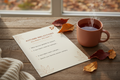 Cozy printable journal prompt sheet flat lay with warm tones